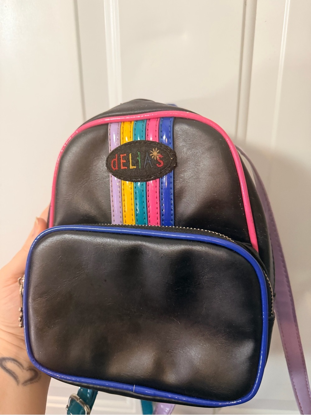 dELiA*s Black Mini Backpack Purse with Rainbow Stripe Detail